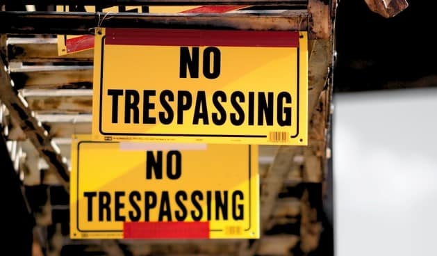 no trespassing sign for combating construction site theft